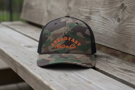 Camo Trucker Hat — "Steadfast Motor Co." Embroidered Mesh Cap